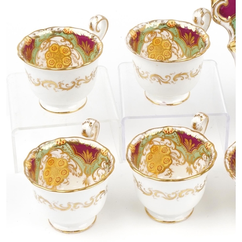 77 - Victorian teaware hand painted and gilded with flowers, seven cups, slop bowl and side plate, the la... 