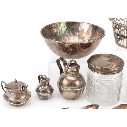 506 - Georgian and later silver including miniature Jersey cream cans, sugar tongs, silver lidded glass ja... 