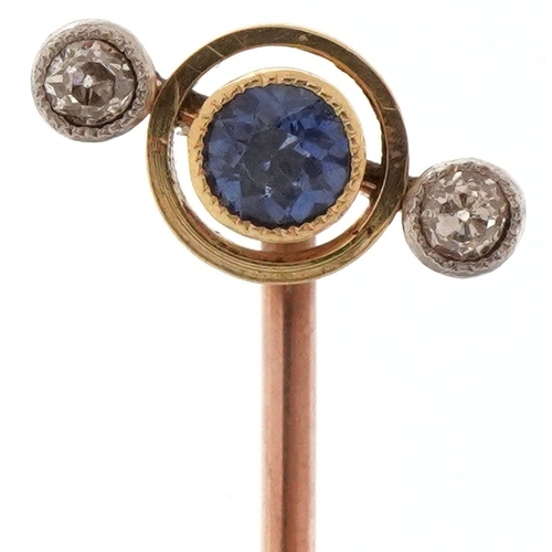 2033 - Art Deco unmarked gold diamond and sapphire three stone stickpin, 5.5cm in length, 1.2g