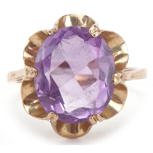 2148 - 9ct gold amethyst solitaire ring, the amethyst approximately 12.10mm x 10.0mm x 6.30mm deep, size K/... 