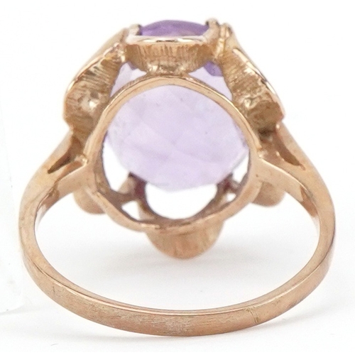 2148 - 9ct gold amethyst solitaire ring, the amethyst approximately 12.10mm x 10.0mm x 6.30mm deep, size K/... 