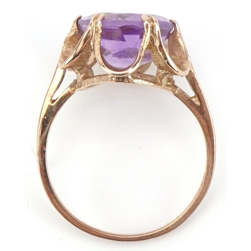 2148 - 9ct gold amethyst solitaire ring, the amethyst approximately 12.10mm x 10.0mm x 6.30mm deep, size K/... 