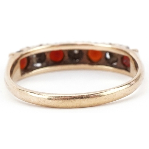 2418 - 9ct gold diamond and garnet half eternity ring, size O, 2.2g