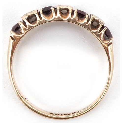 2418 - 9ct gold diamond and garnet half eternity ring, size O, 2.2g