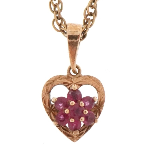 2106 - 9ct gold pink spinel pendant in the form of a love heart on a yellow metal necklace, 1.6cm high and ... 