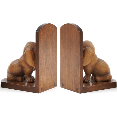 233 - Pair of Art Deco mahogany and lightwood carved dog design bookends, each 18cm high