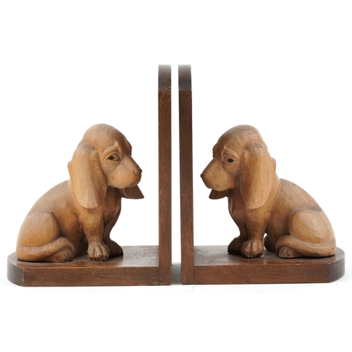 233 - Pair of Art Deco mahogany and lightwood carved dog design bookends, each 18cm high