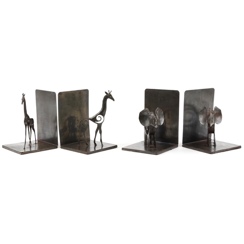 1425 - Two pairs of Modernist cast metal bronzed bookends comprising a pair with giraffes and a pair with e... 