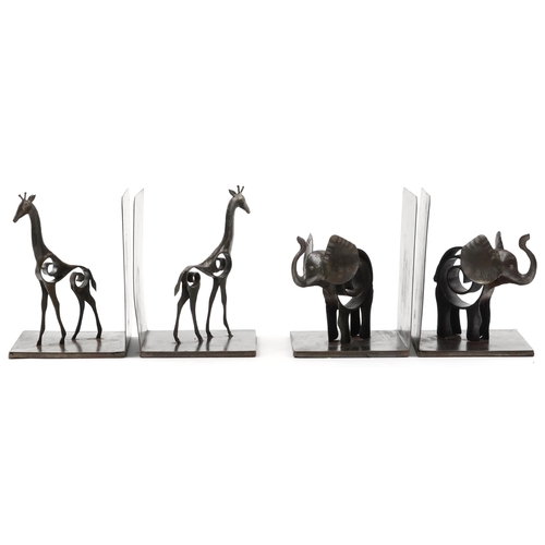 1425 - Two pairs of Modernist cast metal bronzed bookends comprising a pair with giraffes and a pair with e... 