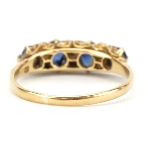 2182 - 18ct gold graduated sapphire and diamond ring set with four sapphires and six diamonds, size L/M, 2.... 