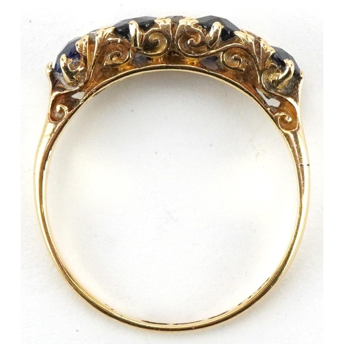 2182 - 18ct gold graduated sapphire and diamond ring set with four sapphires and six diamonds, size L/M, 2.... 