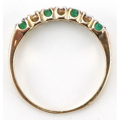 2399 - 9ct gold diamond and emerald half eternity ring, size N/O, 1.6g