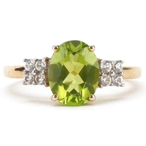 2393 - 10K gold green and clear stone ring, the green stone possibly green amethyst, size L, 2.3g