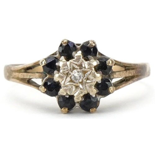 2180 - 9ct gold diamond and blue spinel flower head ring, size S, 2.5g