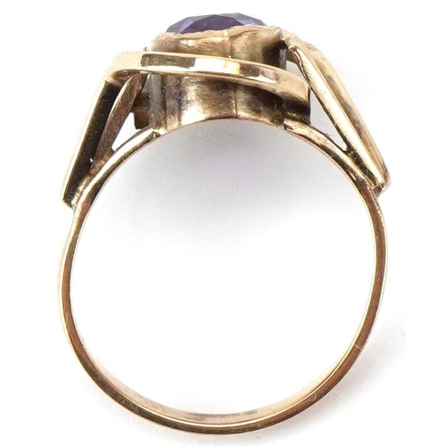 2208 - Modernist 9ct gold amethyst openwork ring, the amethyst approximately 10.50mm x 6.80mm x 5.0mm deep,... 