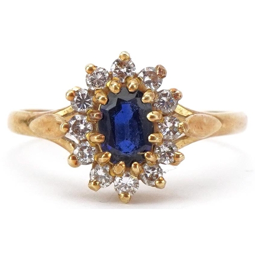 2086 - 18ct gold diamond and sapphire cluster ring, size P/Q, 3.6g