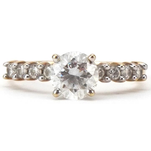 2479 - 9ct gold cubic zirconia solitaire ring with clear stone shoulders, the cubic zirconia approximately ... 