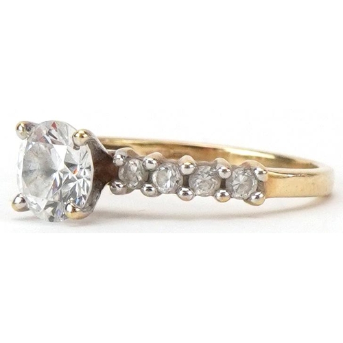 2479 - 9ct gold cubic zirconia solitaire ring with clear stone shoulders, the cubic zirconia approximately ... 