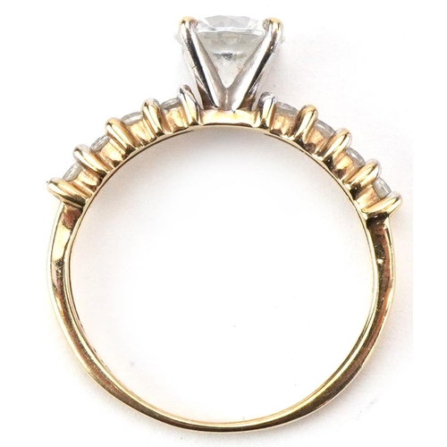 2479 - 9ct gold cubic zirconia solitaire ring with clear stone shoulders, the cubic zirconia approximately ... 