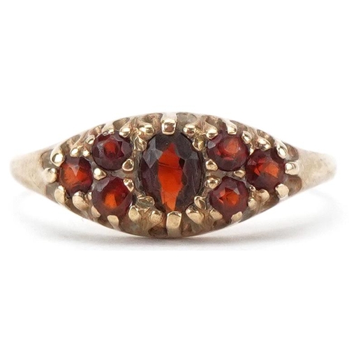 2459 - 9ct gold garnet cluster ring, size I, 1.1g