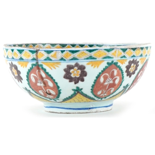 399 - Turkish Ottoman Kutahya bowl hand painted with stylised flowers and foliage, 21cm in diameter