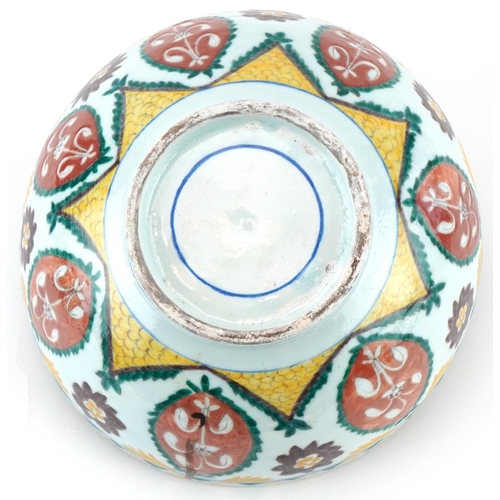 399 - Turkish Ottoman Kutahya bowl hand painted with stylised flowers and foliage, 21cm in diameter