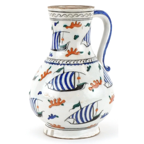 402 - Turkish Ottoman Kutahya water jug hand painted with boats, 23cm high