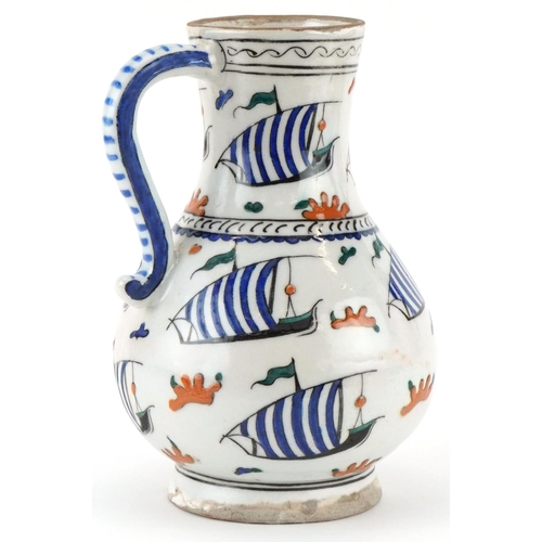 402 - Turkish Ottoman Kutahya water jug hand painted with boats, 23cm high