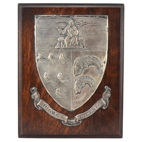 309 - Early 20th century white metal heraldic shield on oak back with Fisher of Birmingham plaque to the r... 