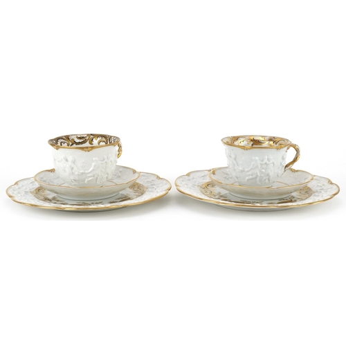 71 - Pair of 19th century Neapolitan porcelain Napoleon and Josephine trios with armorial crests, the lar... 