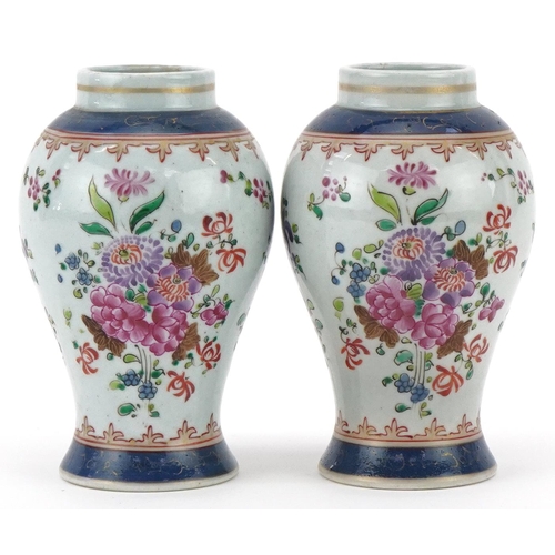 142 - Pair of 19th century Samson porcelain baluster vases hand painted with flowers, each 11.5cm high