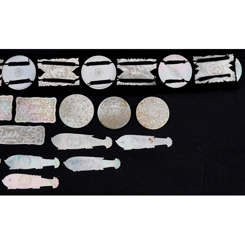 202 - Chinese Canton mother of pearl gaming counters, some arranged on a belt including examples of fish, ... 