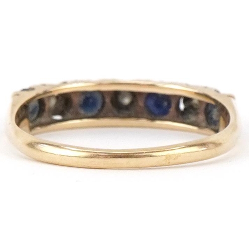 2426 - 9ct gold black spinel and diamond half eternity ring, size O, 2.0g