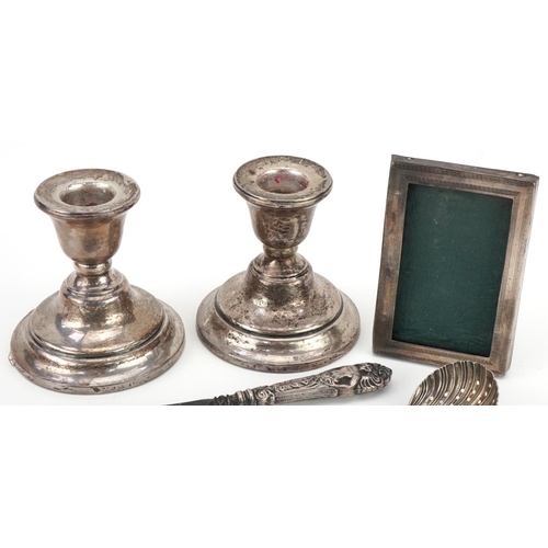 505 - Victorian and later silver including a pair of dwarf candlesticks by Fred H Adams & Co, the largest ... 