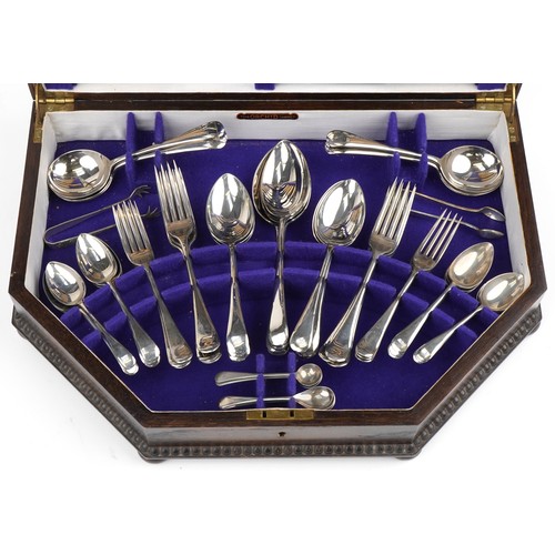 1193 - Art Deco oak six place canteen of Sheffield silver plated cutlery, some with ivorine handles, the ca... 