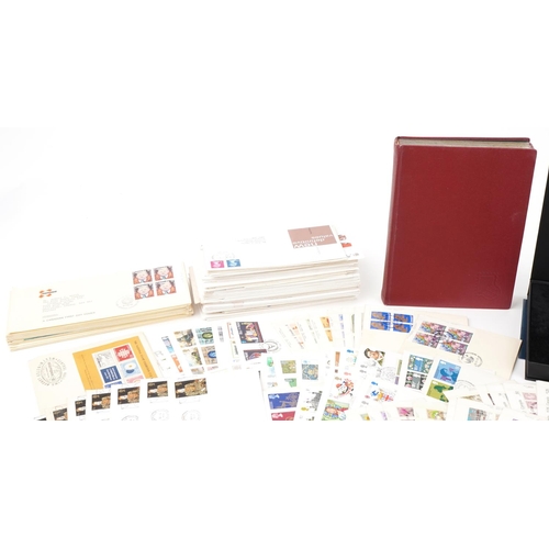 671 - Extensive collection of stamps and coinage including stamps arranged in an album, Canadian first day... 