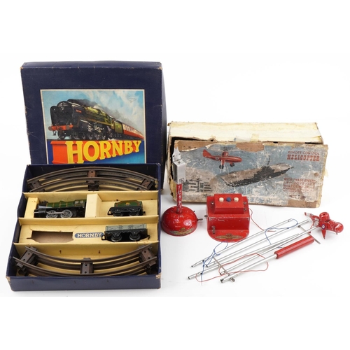 1528 - Hornby O gauge tinplate clockwork part No 20 Goods Set and an Nulli Secundus remote control hellicop... 