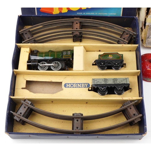 1528 - Hornby O gauge tinplate clockwork part No 20 Goods Set and an Nulli Secundus remote control hellicop... 