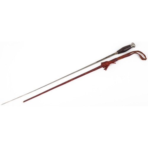 711 - Spanish bull fighting souvenir sword with leather sheath and Toledo blade, 68.5cm in length