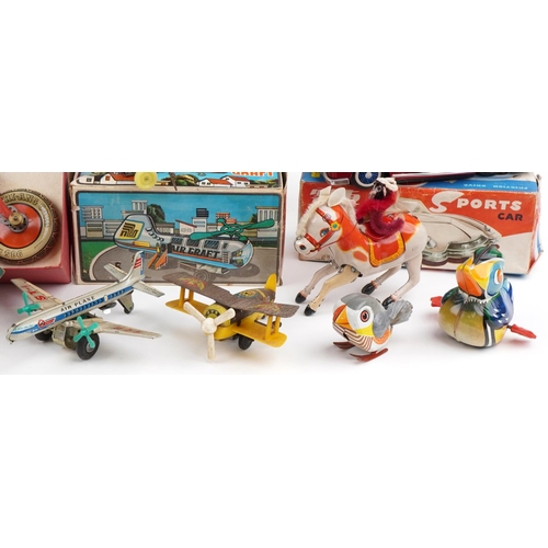 1564 - Vintage and later tinplate toys including Tri-ang Giro Cycle with box, Japanese friction driven aero... 