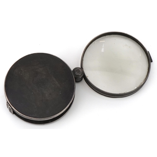 19th century unmarked silver and tortoiseshell folding magnifying glass, 6.5cm in diameter when closed