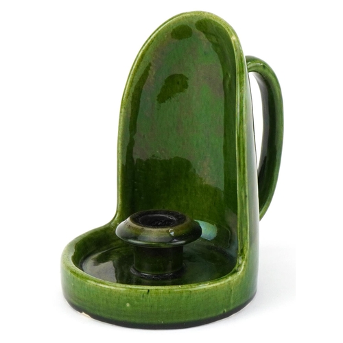 1418 - Arts & Crafts green glazed pottery chamberstick, 17.5cm high