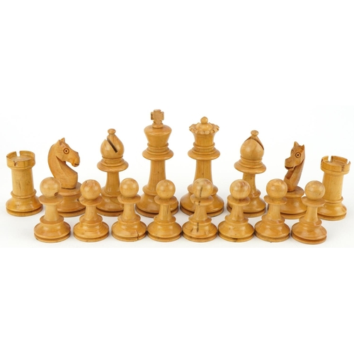 1501 - Boxwood and ebony Staunton pattern chess set housed in a pine case with slide lid, the largest piece... 