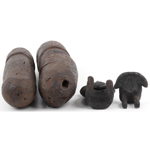 533 - Native American Pre Columbian artefacts including two phallus figures, the largest 26.5cm in length