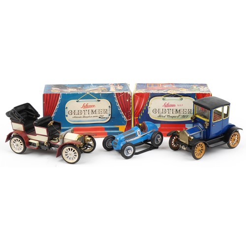 1574 - There Schuco tinplate clockwork vehicles, two with boxes, including Ford Coupe and Mercedes Simplex