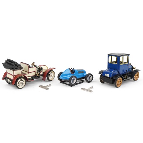 1574 - There Schuco tinplate clockwork vehicles, two with boxes, including Ford Coupe and Mercedes Simplex