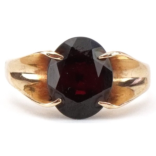 2438 - Modernist 9ct gold garnet solitaire ring, the garnet approximately 10.0mm x 8.0mm x 4.30mm deep, siz... 