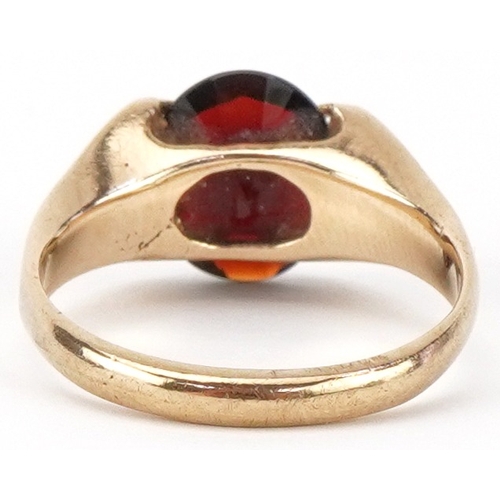 2438 - Modernist 9ct gold garnet solitaire ring, the garnet approximately 10.0mm x 8.0mm x 4.30mm deep, siz... 