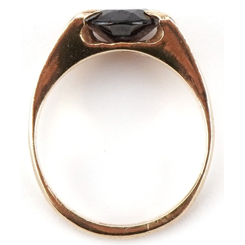 2438 - Modernist 9ct gold garnet solitaire ring, the garnet approximately 10.0mm x 8.0mm x 4.30mm deep, siz... 