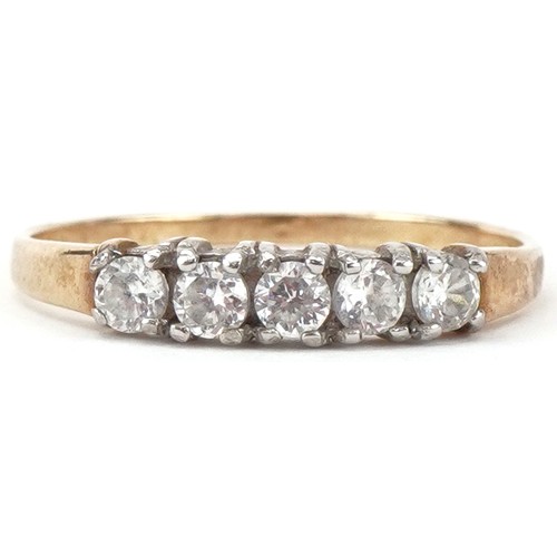 2084 - Unmarked gold cubic zirconia five stone ring, size L/M, 1.0g